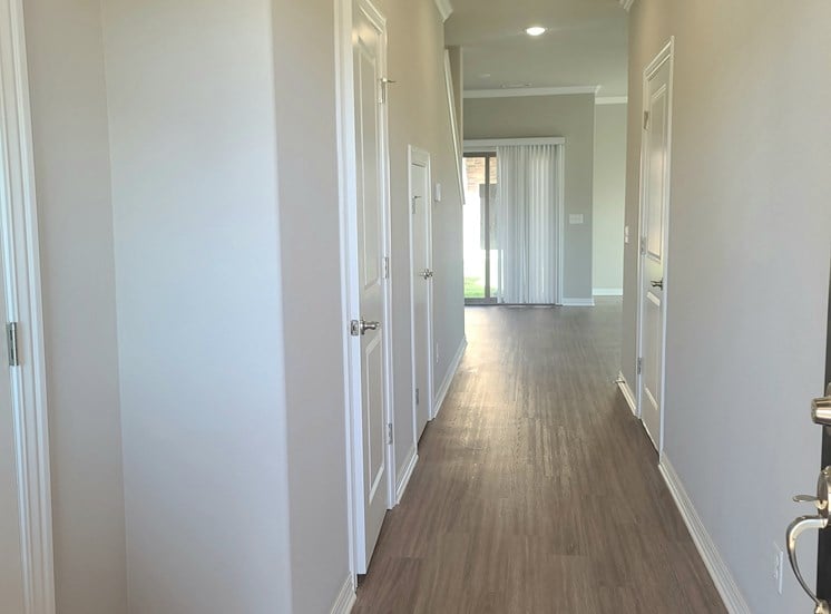 B4 Entry with coat closet and laminate wood flooring